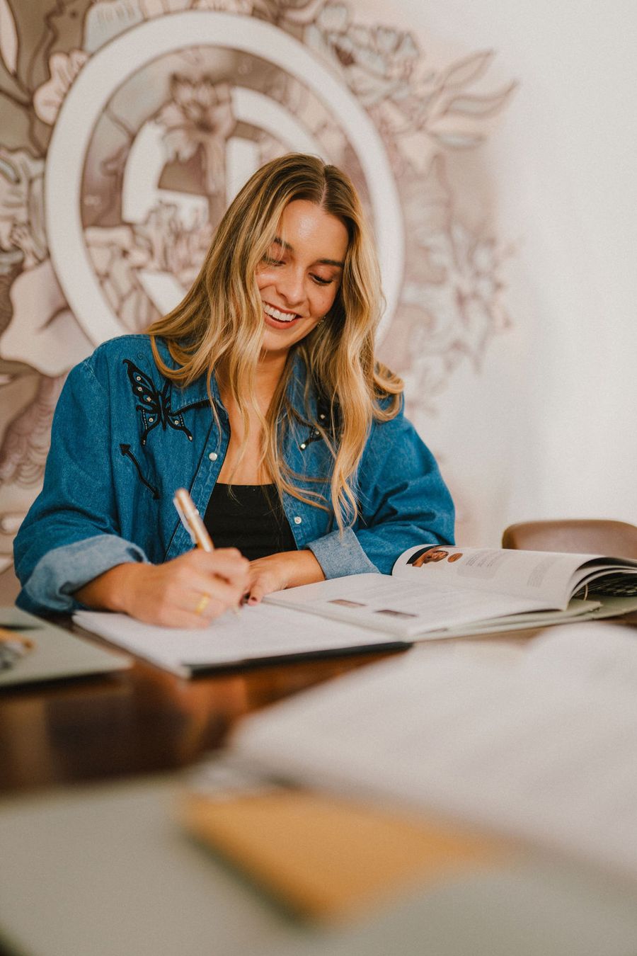 Student earning her spray tan certification online with NSTPA